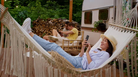 friends relaxing in a hammock