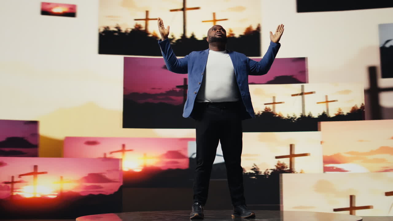 Black spiritual adult meditating on faith and serenity in a pose of worship