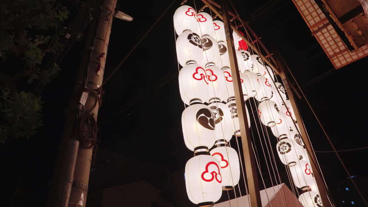 Traditional Japanese Lanterns Illuminated at Night