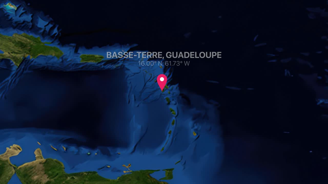 A digital earth render zooms from a world map view into Basse-Terre, Guadeloupe