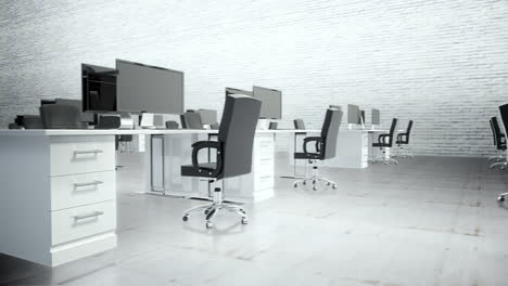 empty office with desks and computers