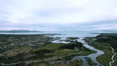 aerial of thingvellir mountains with river and roads, iceland