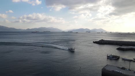 boat is sailing to the port at namhae, south korea