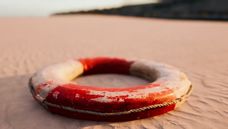 lifebuoy on the city beach at sunset