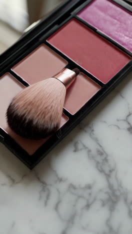 makeup palette on marble table