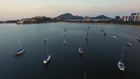 Aerial-image-of-the-city-of-VitÃ³ria-in-EspÃ­rito-Santo,-Brazil,-smooth-motion-video-showing-several-vessels---in-high-resolution-4k