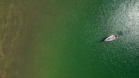 Boat-anchored-off-a-beach-in-ireland