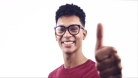 thumbs up, face of man and happy in studio