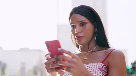 person looking at a smartphone outdoors
