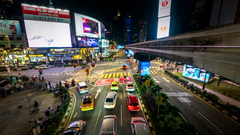 dynamic nightlapse with light trails at popular kl bukit bintang intersection