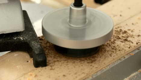 circular hole saw drill bit in action, close-up