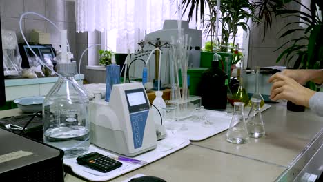 Woman work in laboratory. Make the research