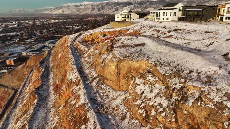 AERIAL---Snowy-winter-in-Ridge-North,-North-Salt-Lake,-Utah,-forward-tilt-up