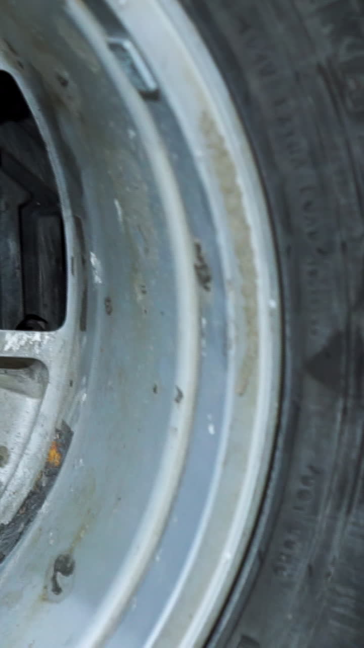 Close-up of a vehicle tire and mudguard