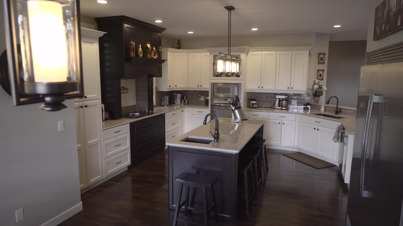Beautiful Kitchen clip with a dining room light in the foreground