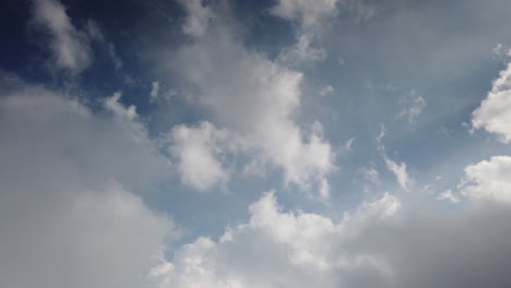 two layers of fluffy white clouds moving fast in opposite direction, kodaikanal, tamul nadu