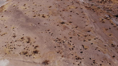 Aerial-drone-shot-over--desert-land