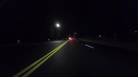 a night time hyper lapse following a motor cycle