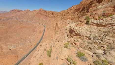 fpv drone flying close to red rock sandstone cliffs of arizona in antelope pass vista