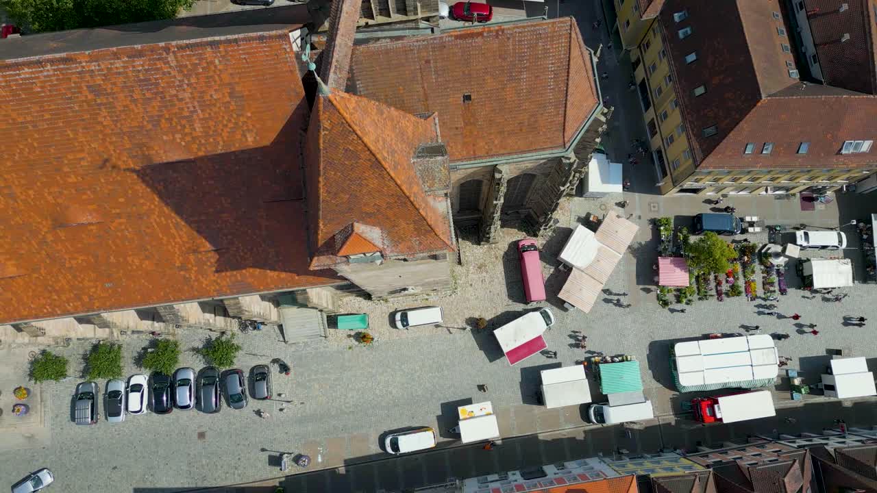 4K Aerial Drone Video of Shoppers at the Saturday Morning Farmers Market in Downtown Ansbach, Germany
