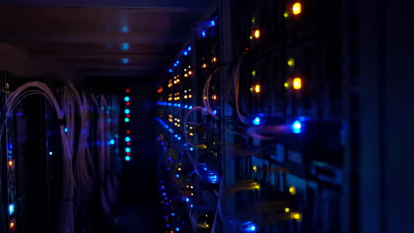 blinking lights and cables in a modern data center