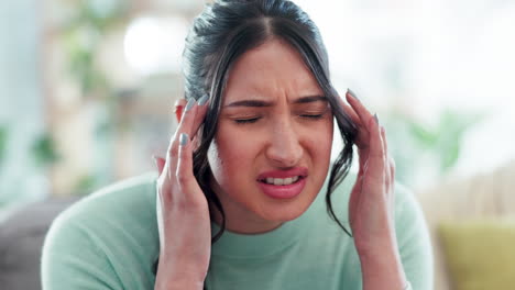 face, woman and pain of headache in home