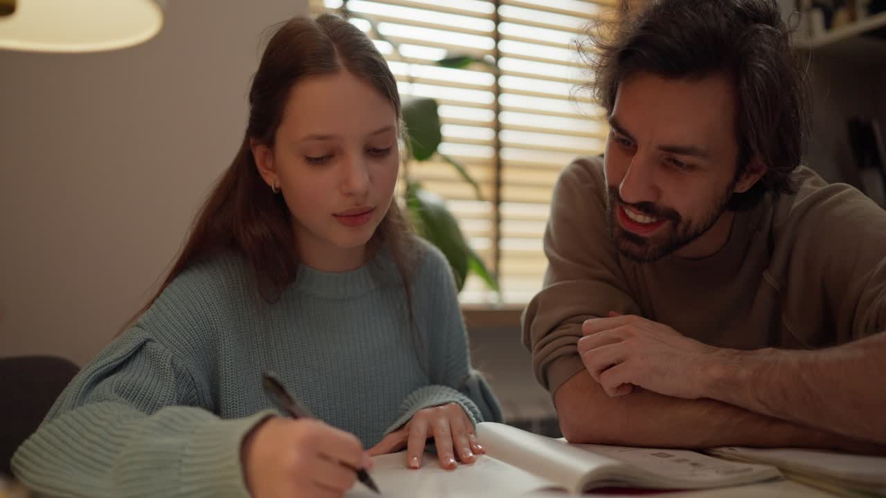 Young woman studying with a man