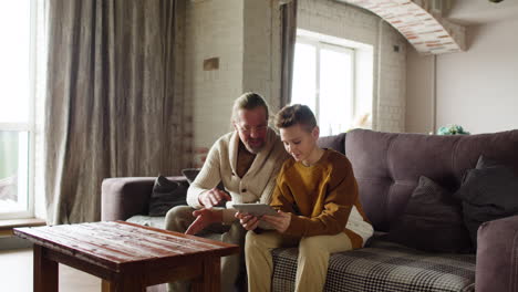 Caucasian-man-and-boy-in-the-living-room