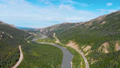 4K-Drone-Video-of-Chulitna-River,-Alaska-Railroad-and-George-Parks-Highway-Alaska-Route-3-near-Denali-National-Park-and-Preserve,-AK-during-Summer