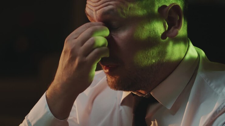 Tired Man Working At Night