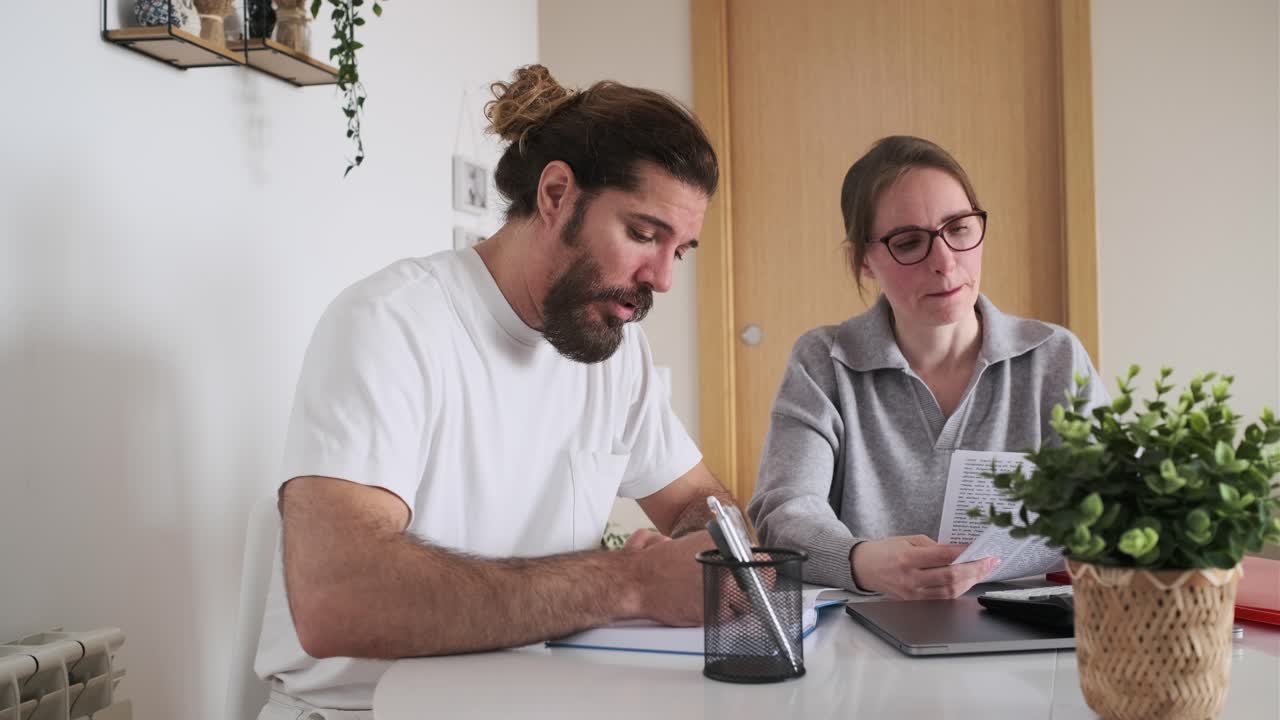 Couple working at home office