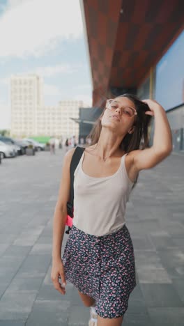 young woman walking in a city