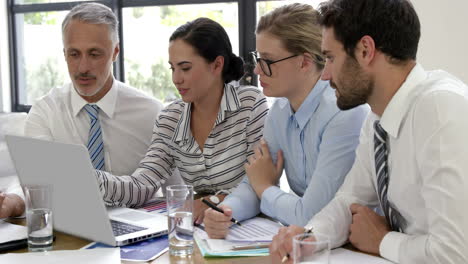 concentrated business people speaking together