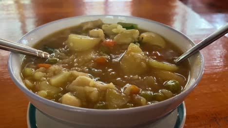 A-bowl-of-sherpa-stew-sitting-on-a-table