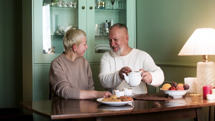Couple having tea at home