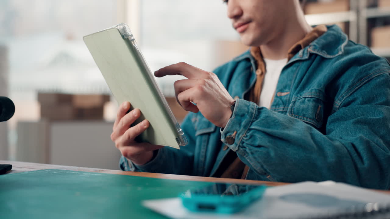 Man using a tablet indoors