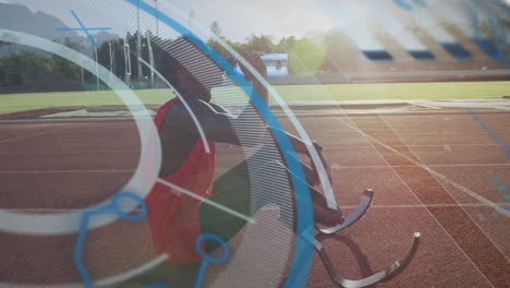 animation of digital data processing over disabled male athlete with running blades on running track