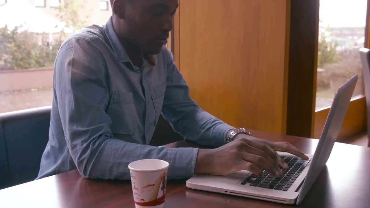 Handsome man using laptop