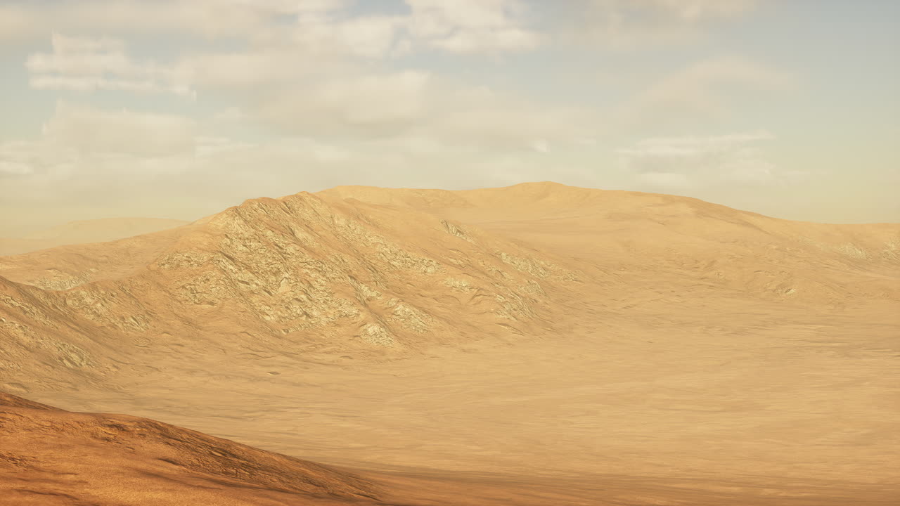 사막의 모래 언덕 위에 해가 지는 것