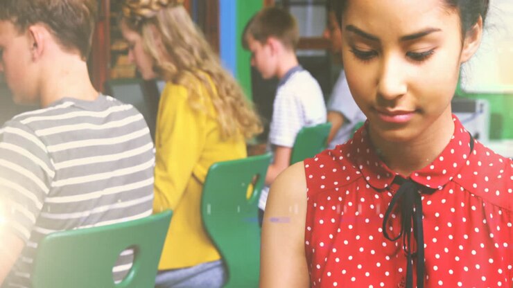 Animation of happy biracial female teenager student using tablet at school