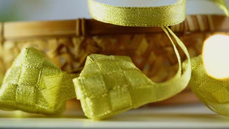 selective focus of ribbon ketupat against defocused light