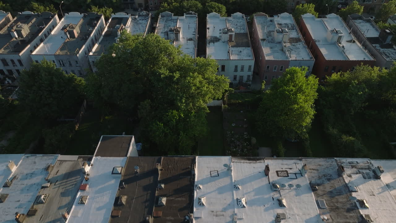 Aerial view of brownstone rooftops in Brooklyn. Shot at sunrise in Crown Heights