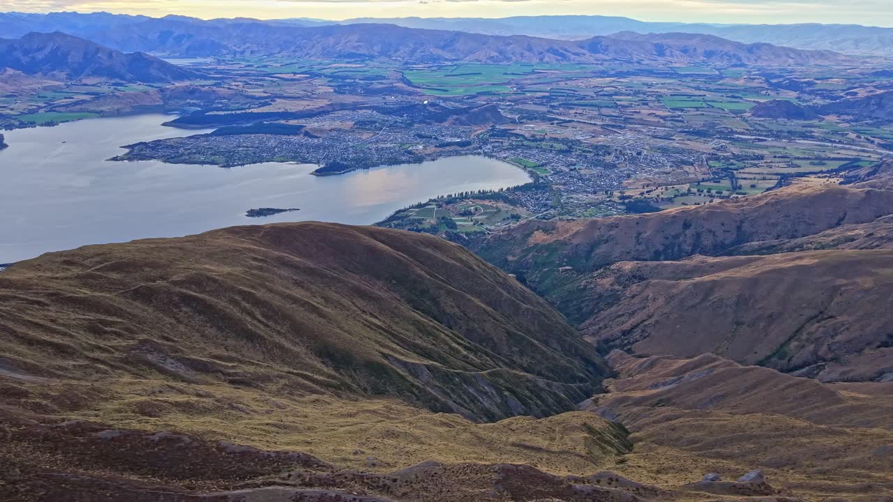 Wanaka lake and town view with hills in central Otago, New Zealand