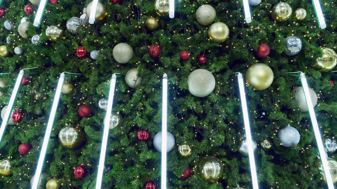 A closer shot of a Christmas tree in the middle of a shopping mall in Pattaya City, Chonburi province in Thailand