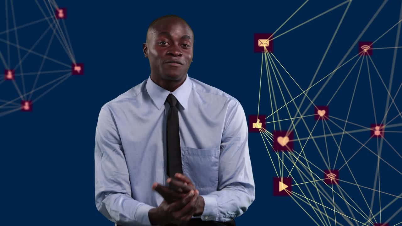 Animation of networks of connection with icons over african american businessman