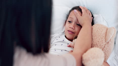 Woman,-sick-child-in-bed-with-comfort-for-cold