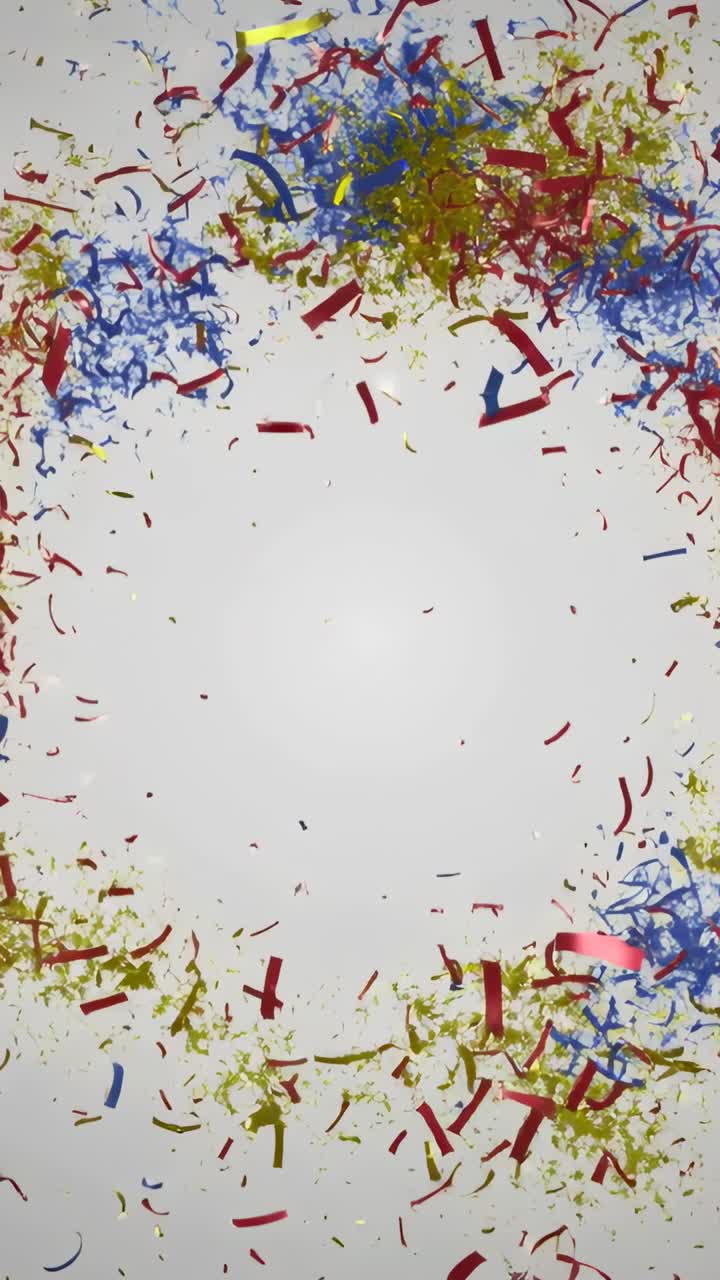 Vertical video: Shifting wreath multicolored confetti dispersing on white backdrop, revealing void