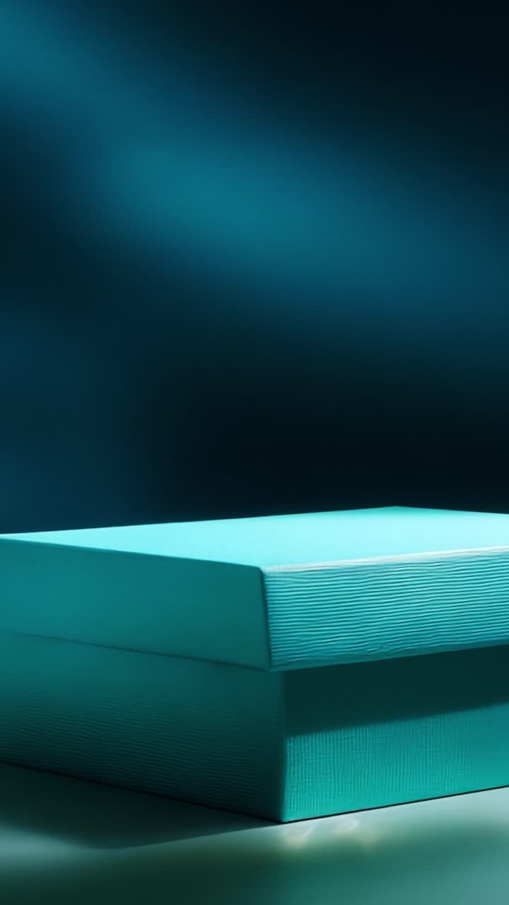 A Beautifully Designed Teal Gift Box with a Shiny Gold Interior, Captured in Two Elegant Frames Showcasing Its Stunning Color and Unique Textures against a Glistening Background