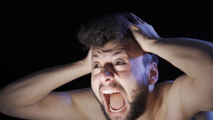 Mentally ill man going crazy and shouting.