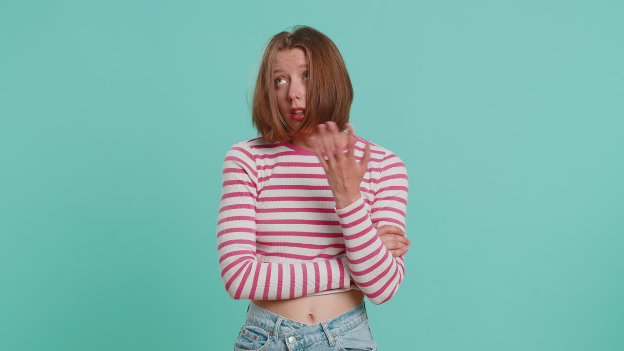 Young woman making face palm gesture feeling bored disappointed in result bad news sorrowful